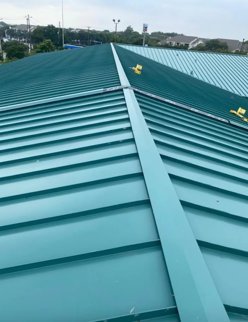 Green commercial metal roof ridge and valley for Metal Roof Repair in Oak Hill